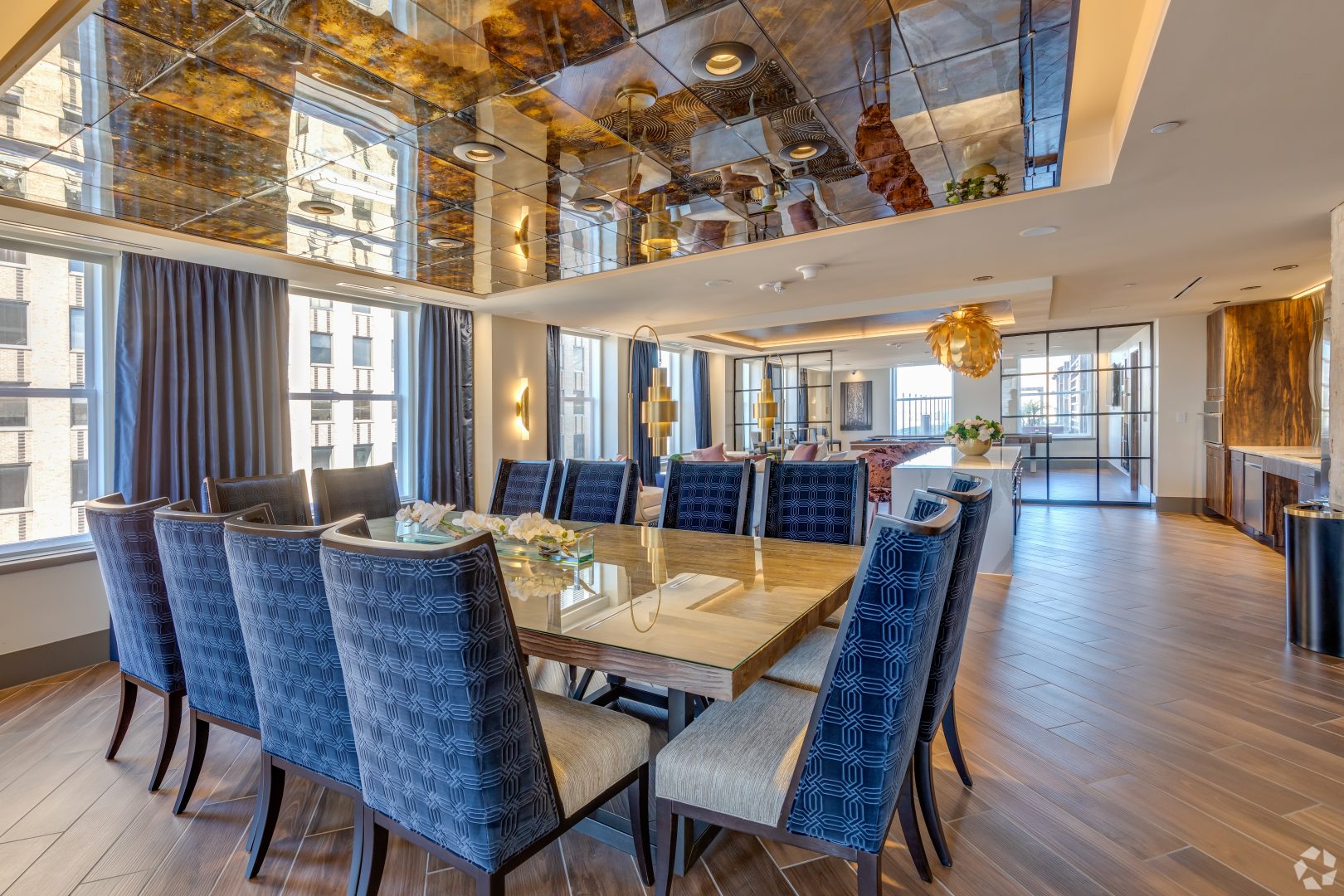 a dining room with a large table and chairs at The  First